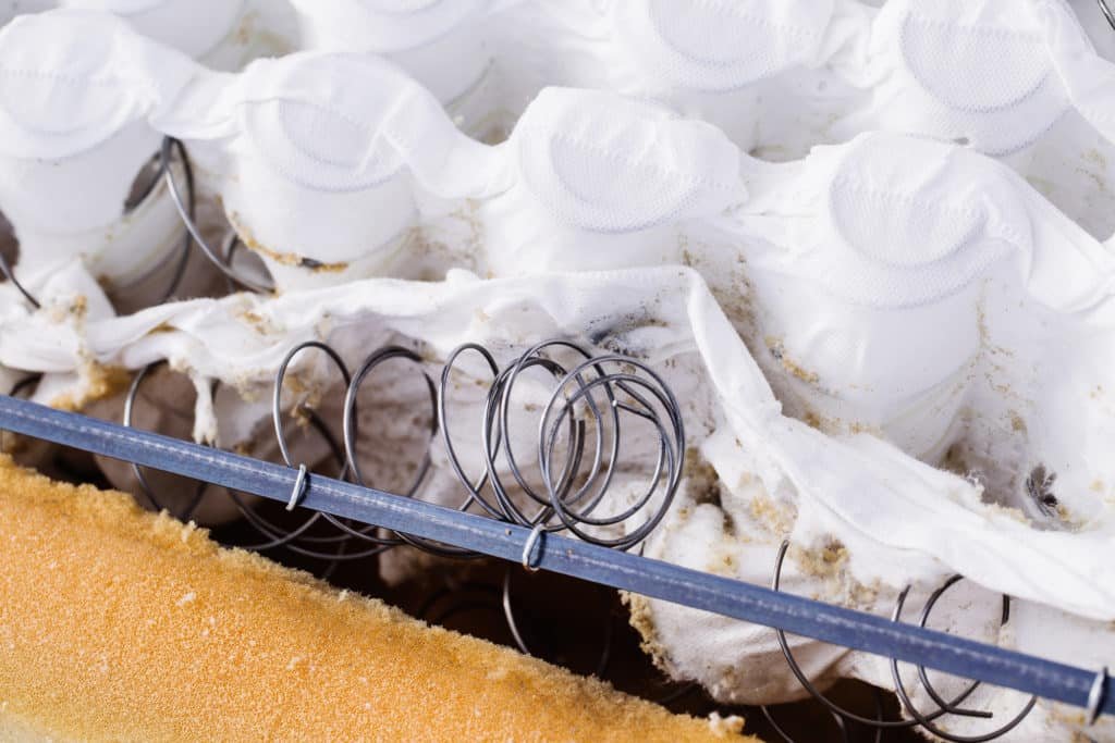 broken mattress spring close up