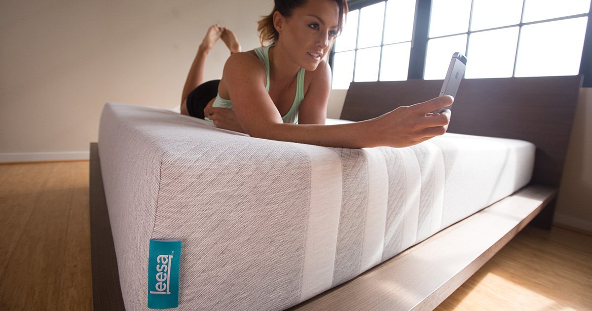 Leesa Mattress A lady laying down on her Leesa mattress