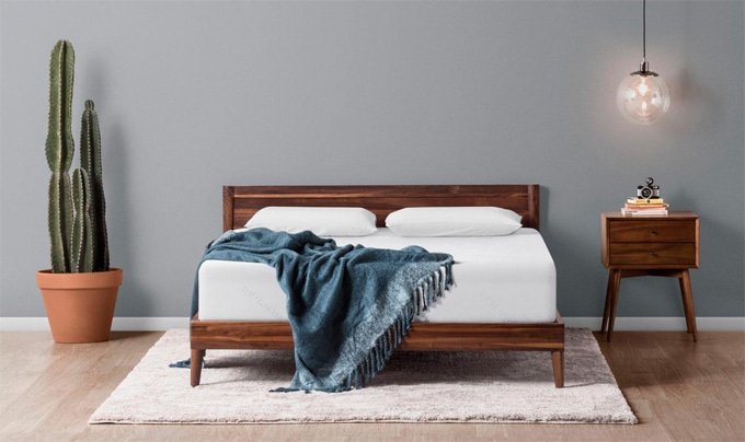 Tuft and Needle mattress A Tuft and Needle mattress on a platform bed