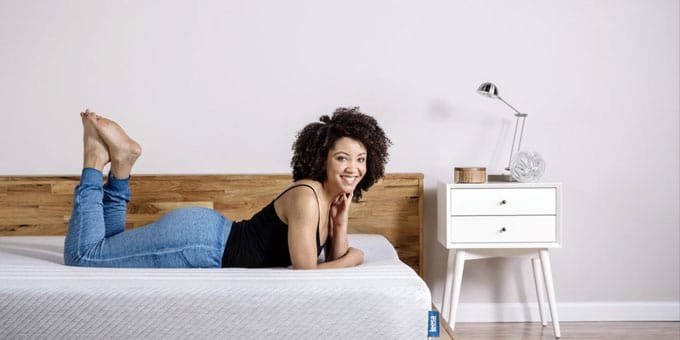 The Leesa Mattress on a wooden bed