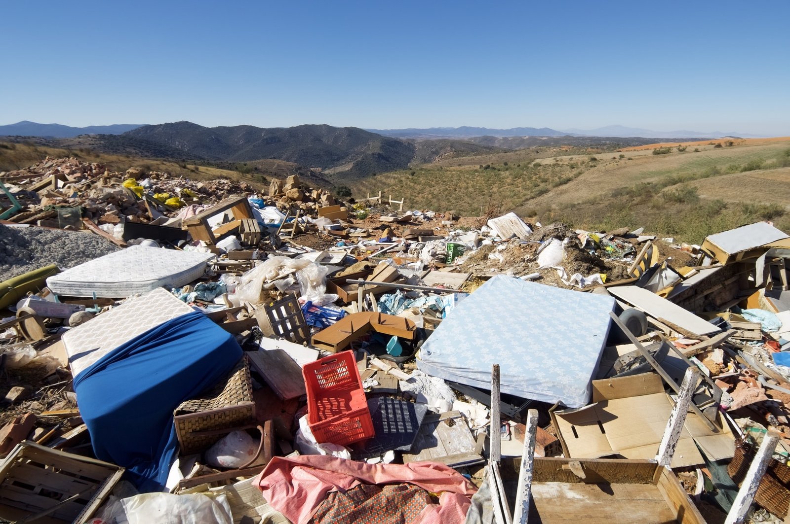 Pile of old mattresses in a landfill site