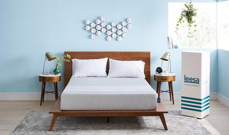 The Leesa Mattress on a wooden platform bed