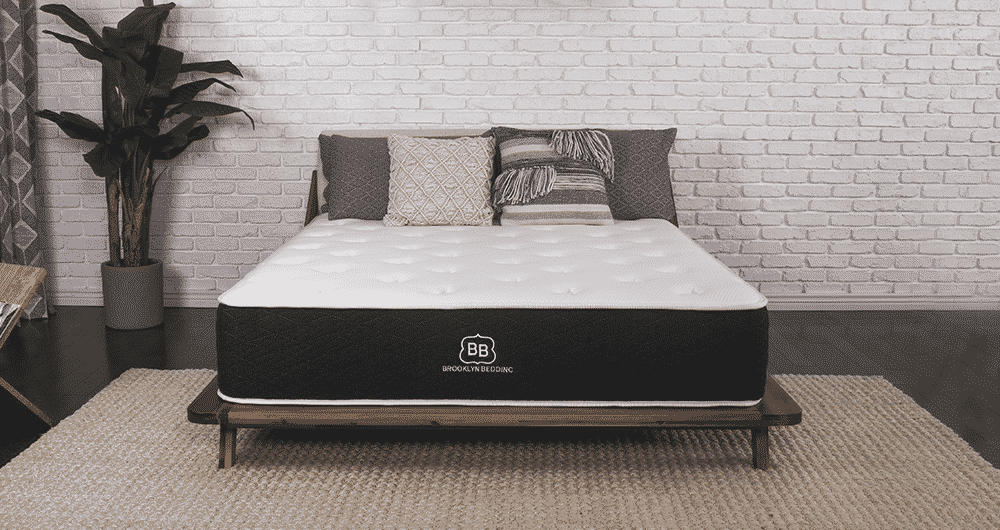 A Brooklyn Bedding Signature on a platform bed