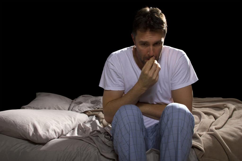 Anxious man unable to sleep