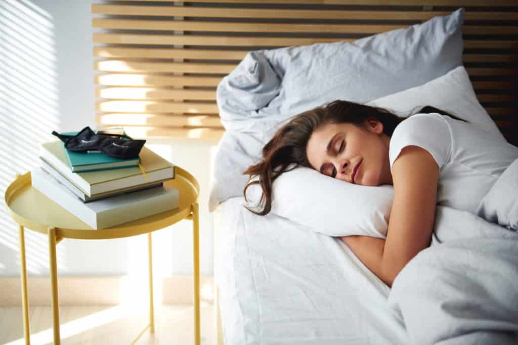 Stomach sleeping woman