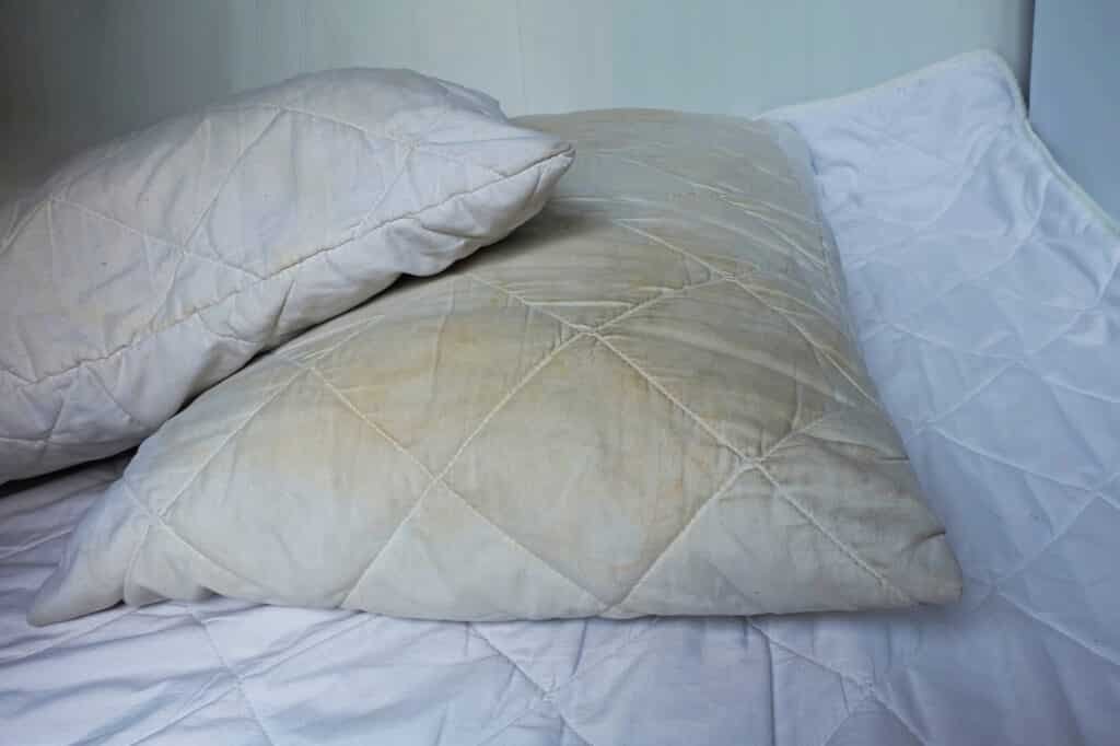 dirty yellow pillow