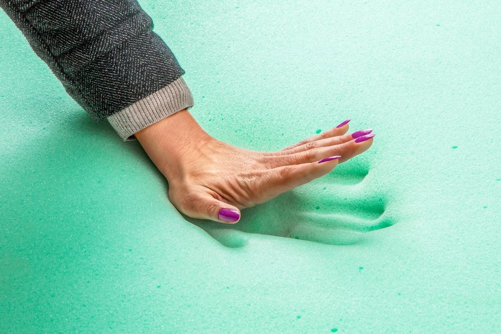 Hand stamp on low density memory foam mattress